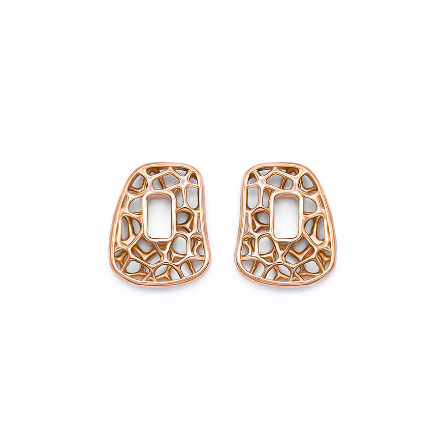 One pair of Puzzle element 18k openwork rose gold